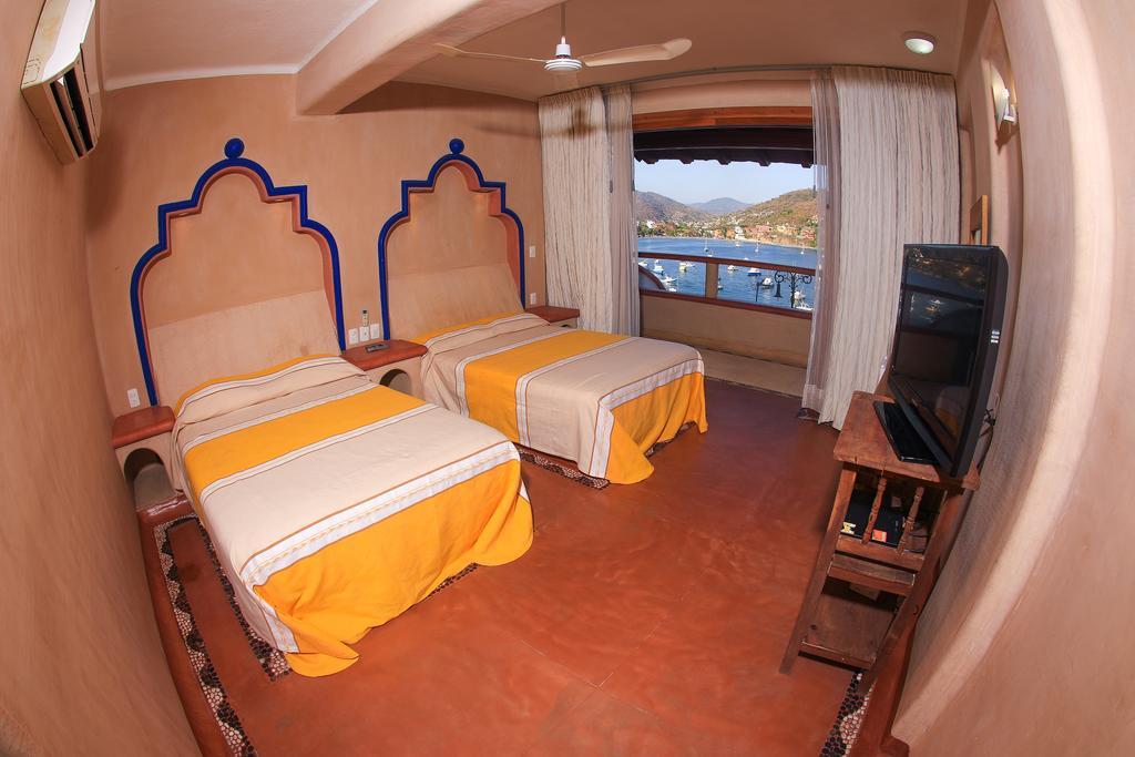 Villa Del Pescador Сиуатанехо Стая снимка